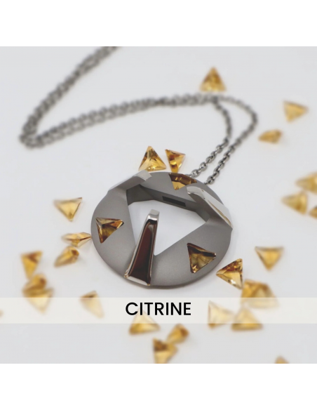 Paire enchevêtrée avec pendentifs en pierres précieuses